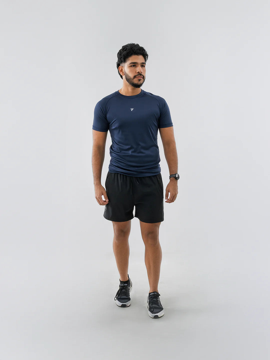 Camiseta deportiva hombre azul turquí manga corta TENFIT Colombia