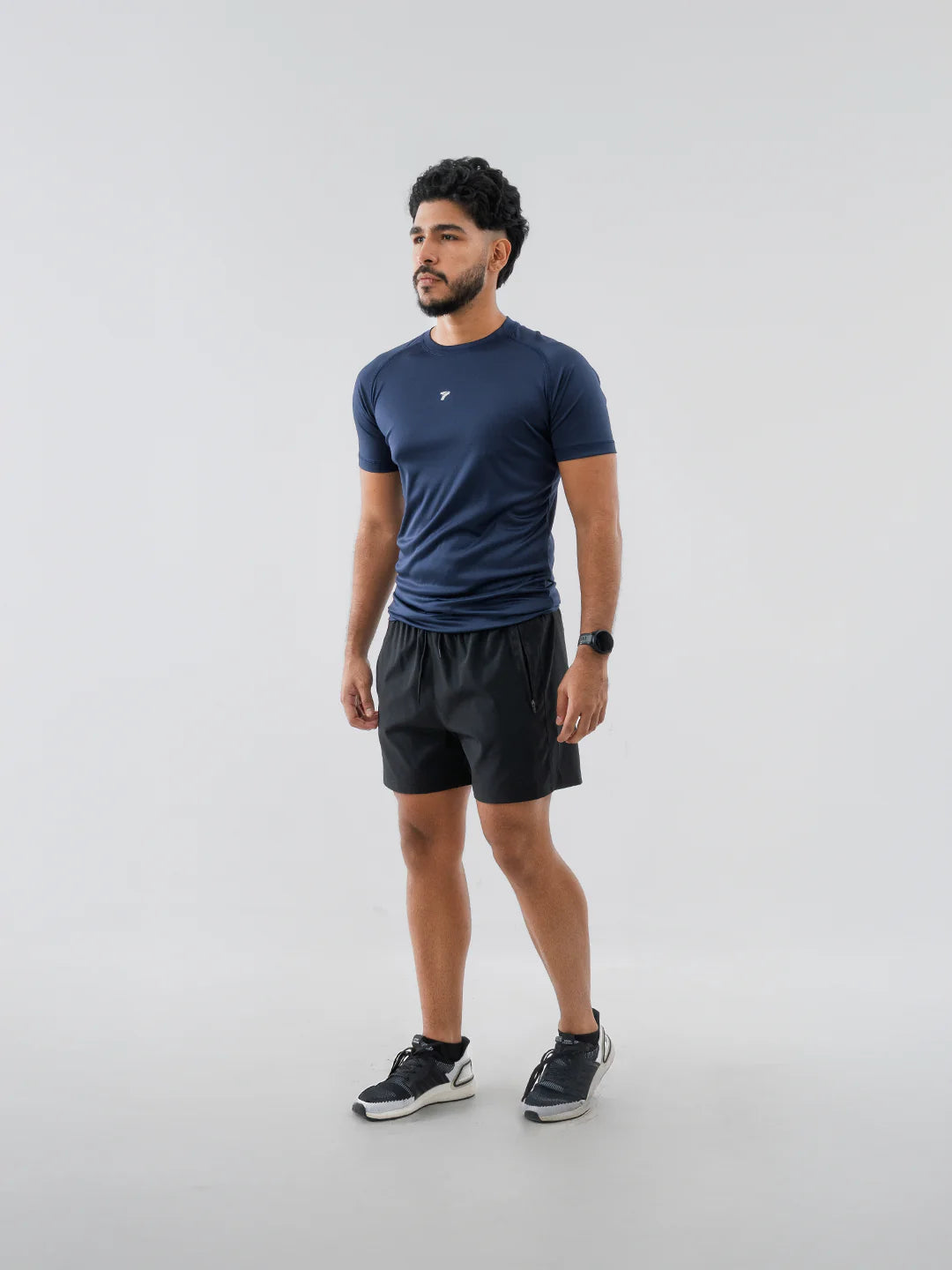 Camiseta deportiva hombre azul turquí manga corta TENFIT Colombia