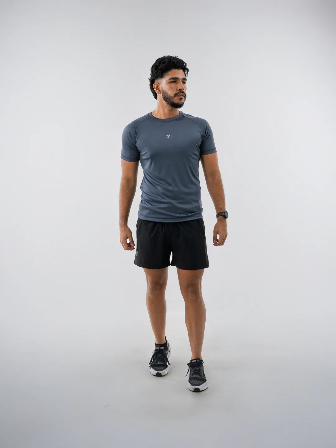 Camiseta deportiva hombre gris oscuro manga corta TENFIT Colombia