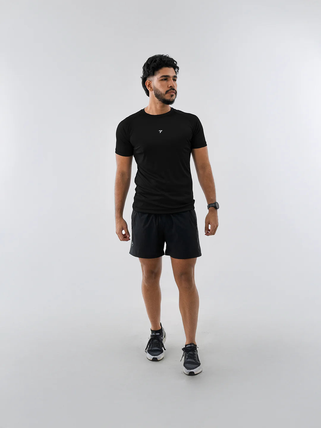 Camiseta deportiva hombre negra manga corta TENFIT Colombia