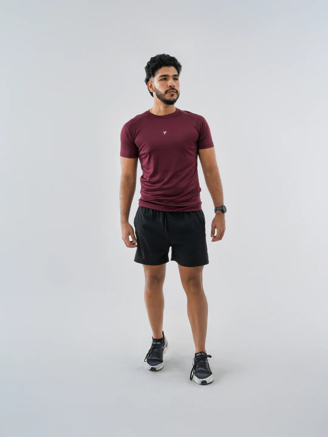 Camiseta deportiva hombre vinotinto oscuro manga corta TENFIT Colombia