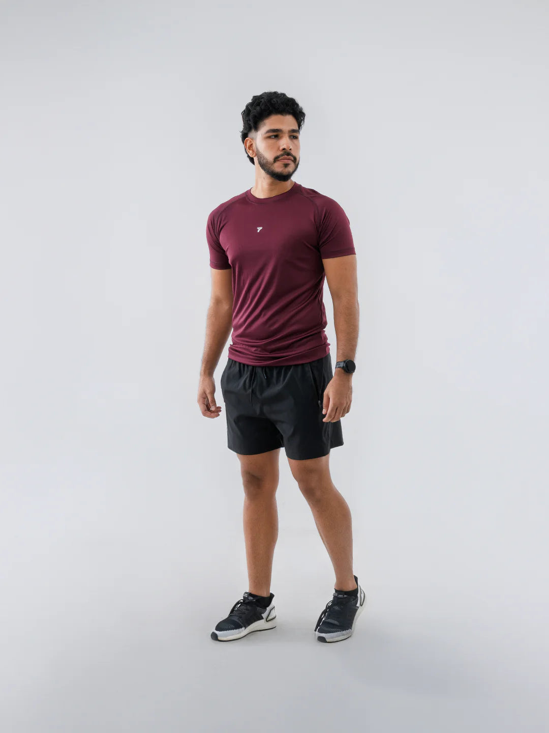 Camiseta deportiva hombre vinotinto oscuro manga corta TENFIT Colombia