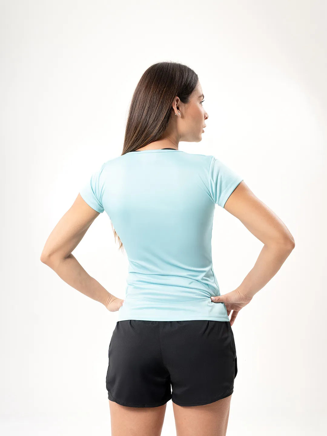 Camiseta deportiva verde menta posterior media distancia TENFIT mujer