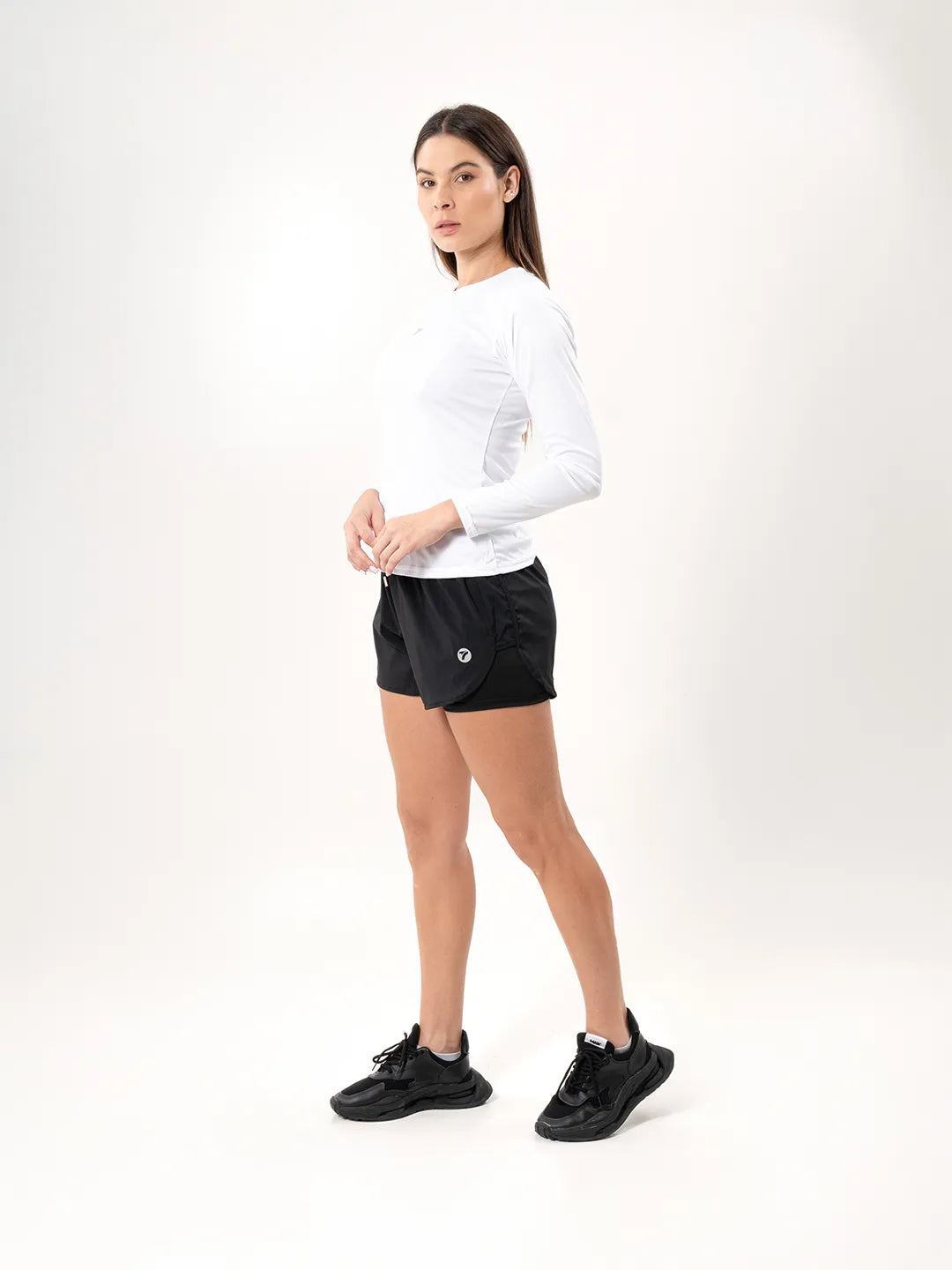 Buzo licra blanco TENFIT mujer — vista lateral completa
