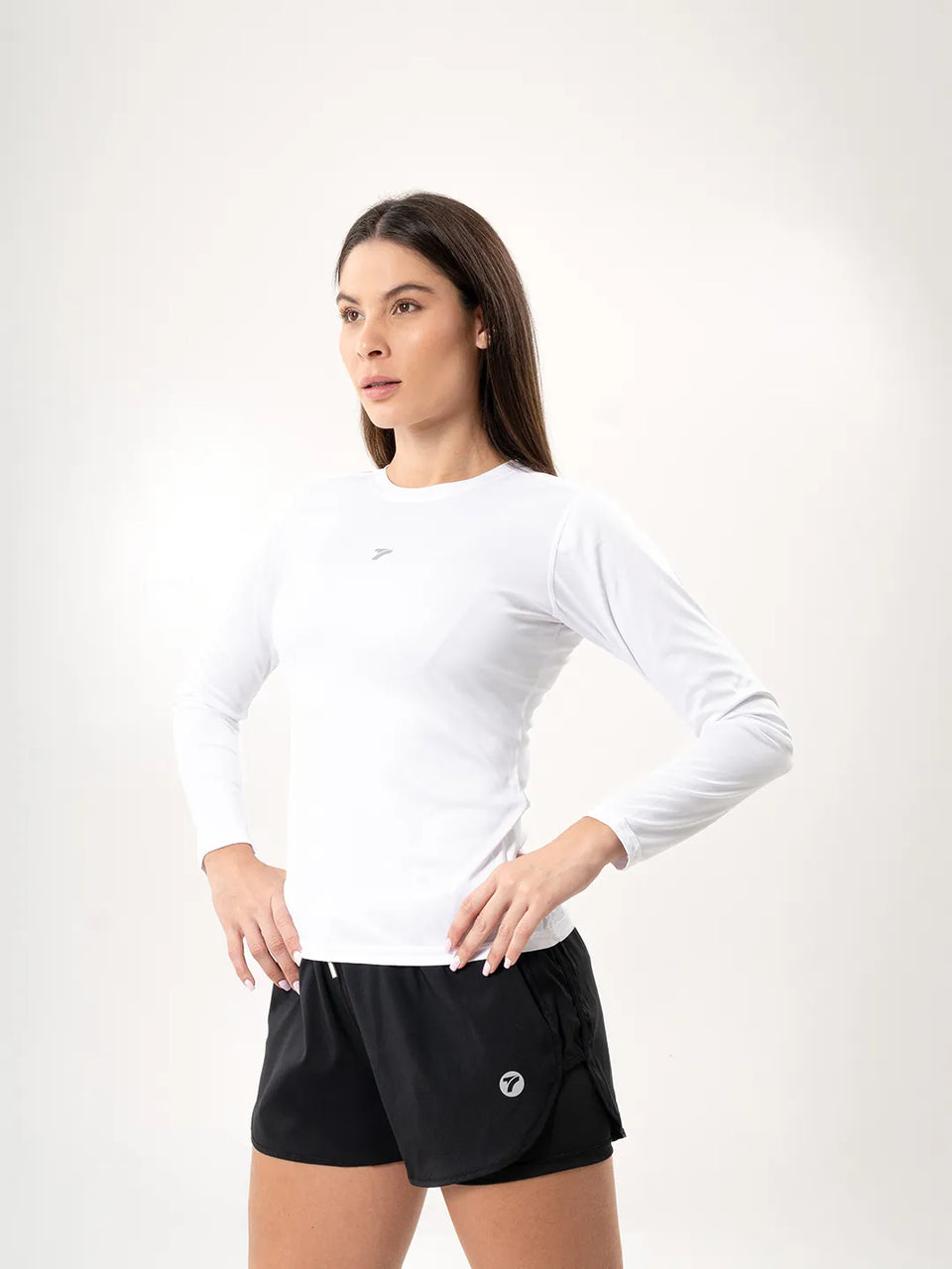 Buzo compresión mujer blanco TENFIT vista lateral — ajuste ceñido
