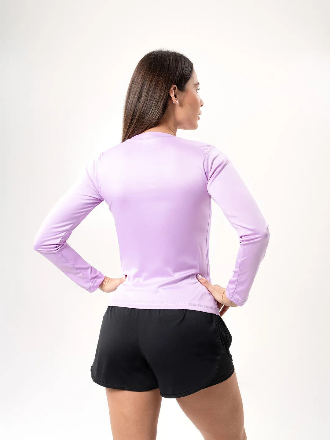 Buzo compresión lila TENFIT — espalda sin transparencias