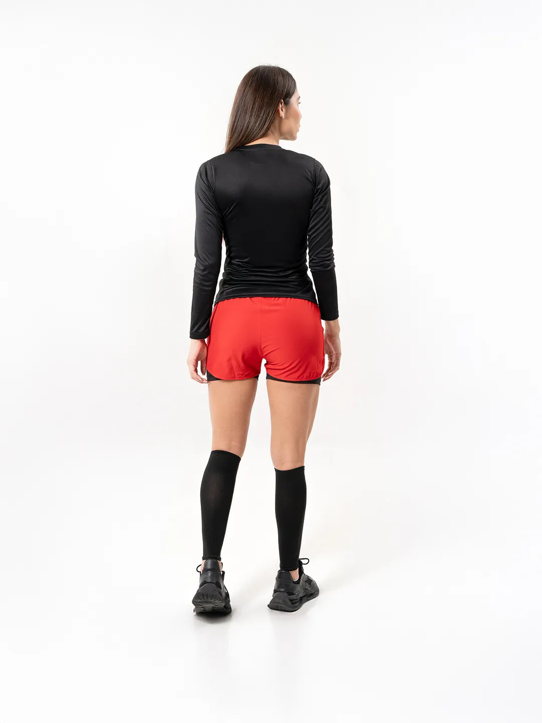 Buzo licra negro mujer TENFIT espalda — cobertura total
