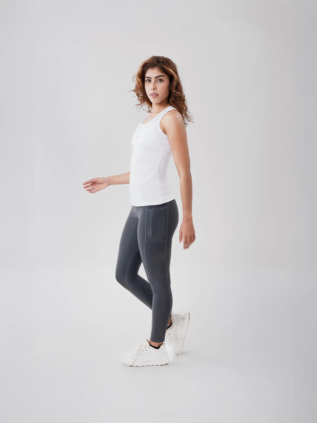 Esqueleto sin mangas blanca Super Licra — ajuste lateral TENFIT