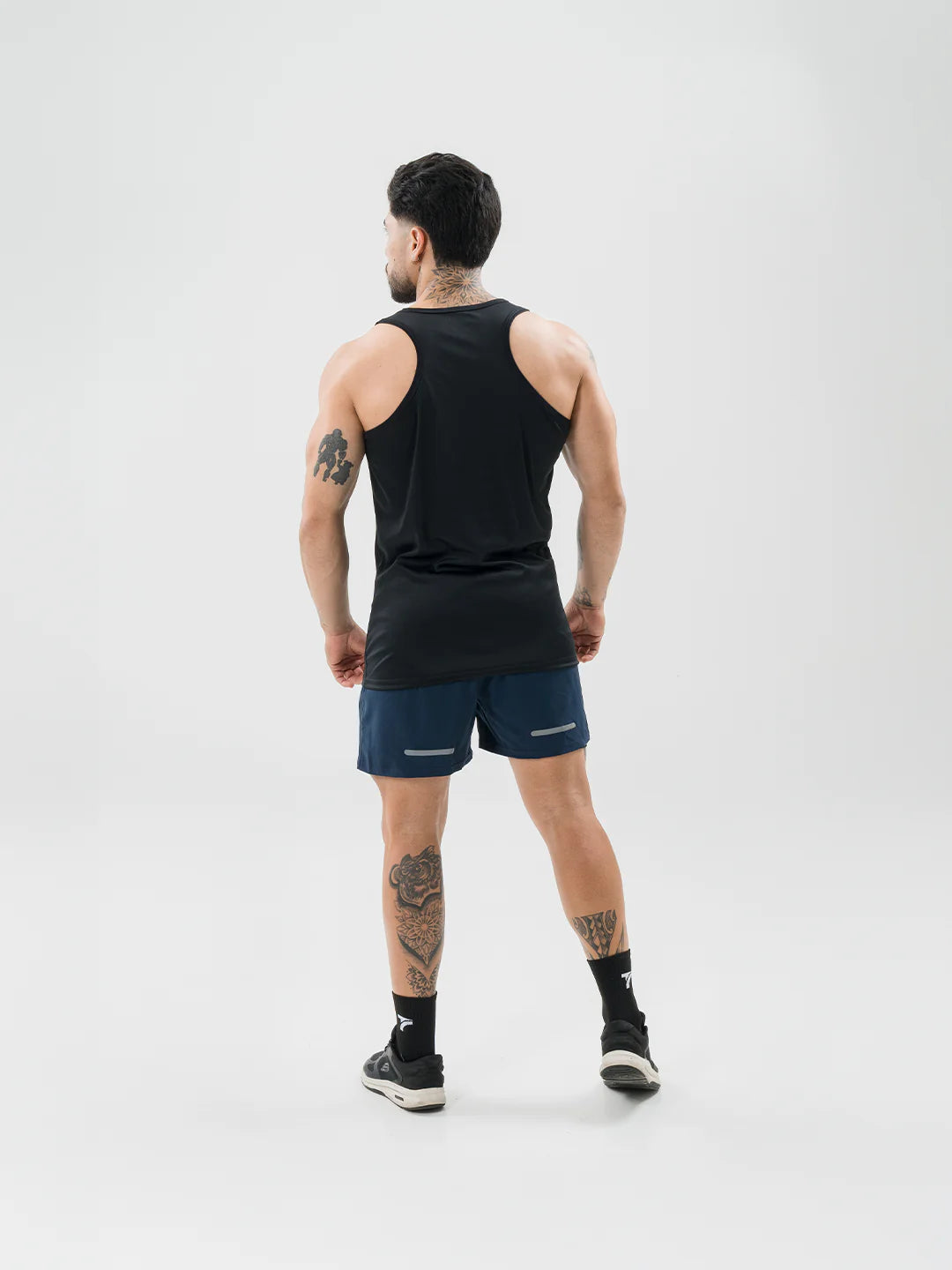 Espalda completa camiseta sin mangas negro hombre hecho en Colombia TENFIT
