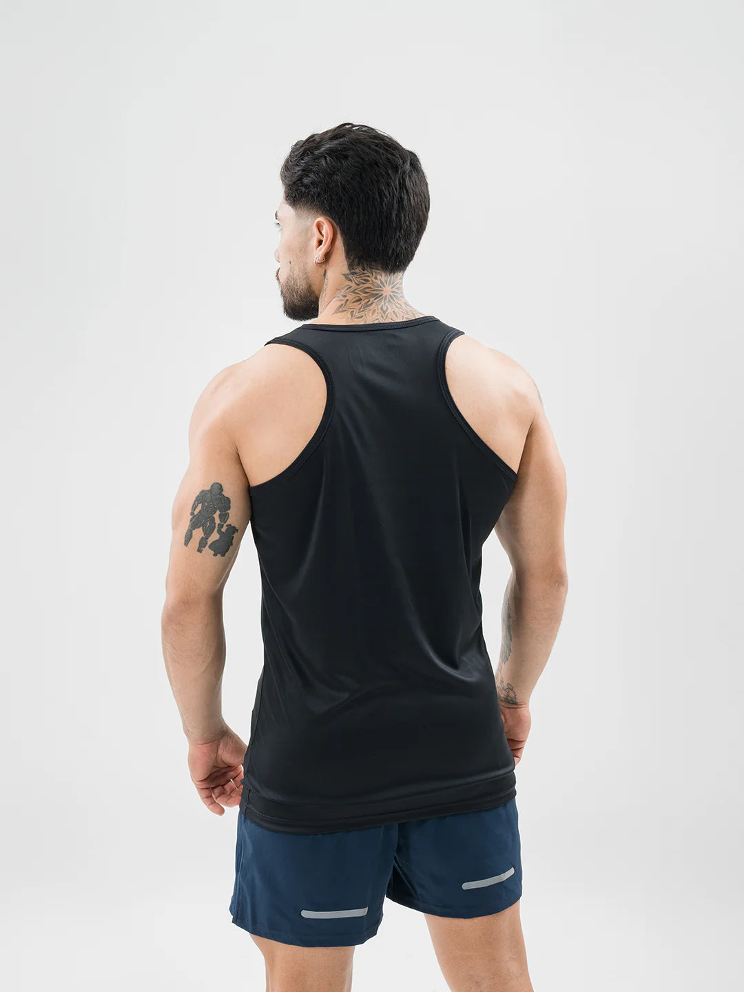 Vista espalda esqueleto negro hombre UV 30 TENFIT