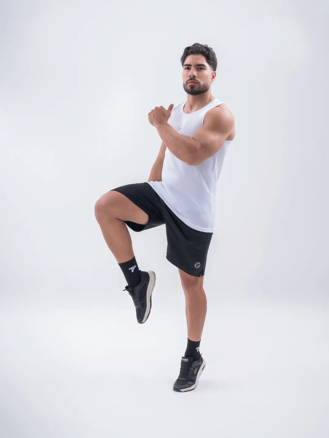 Camiseta sin mangas blanca hombre gym running TENFIT Colombia