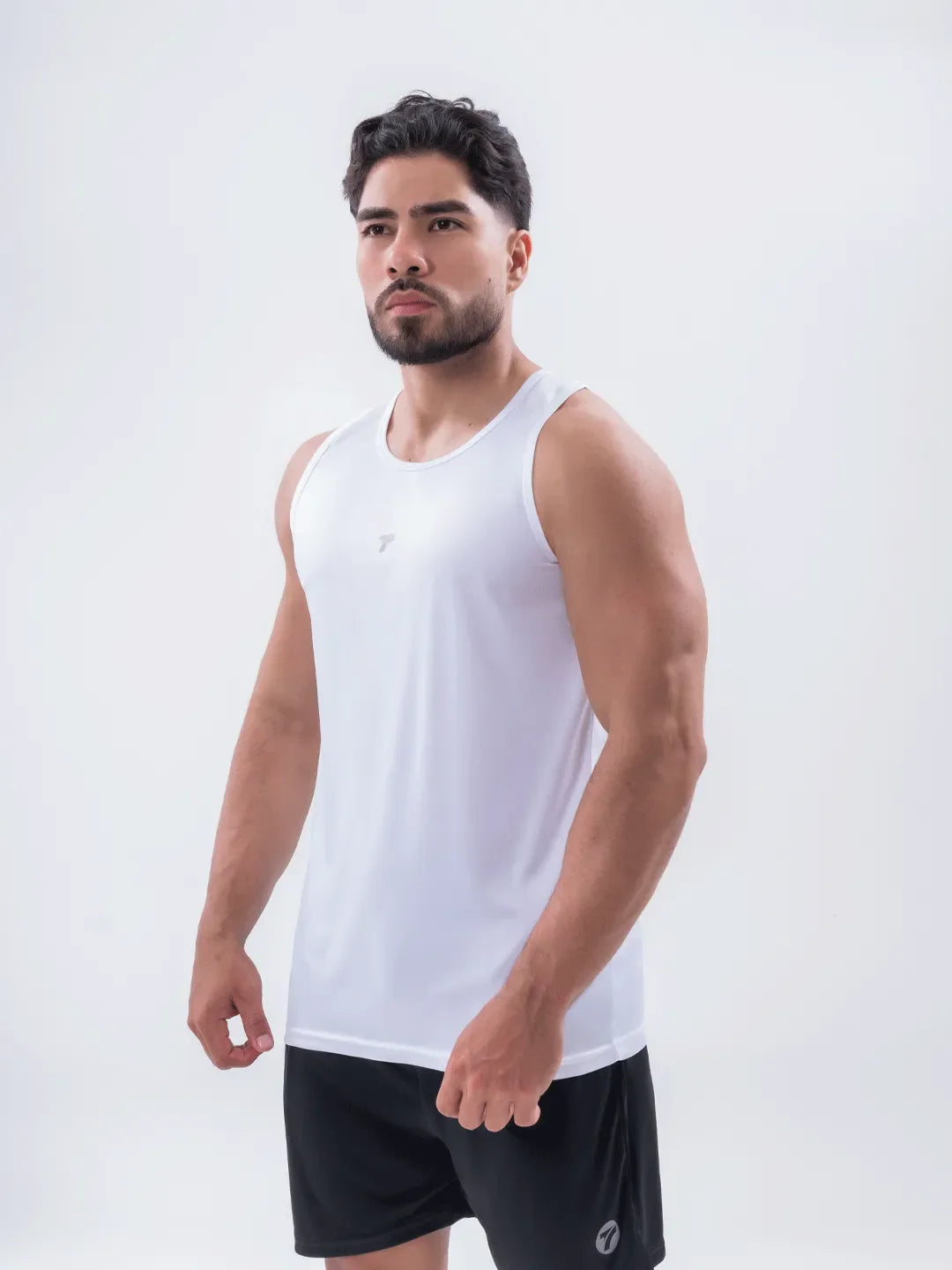 Lateral esqueleto blanco dri-fit hombre hecho en Colombia TENFIT