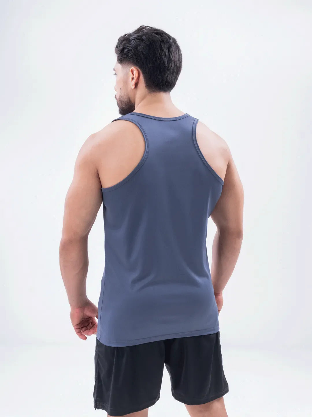 Vista espalda esqueleto gris oscuro dri-fit hombre TENFIT Colombia