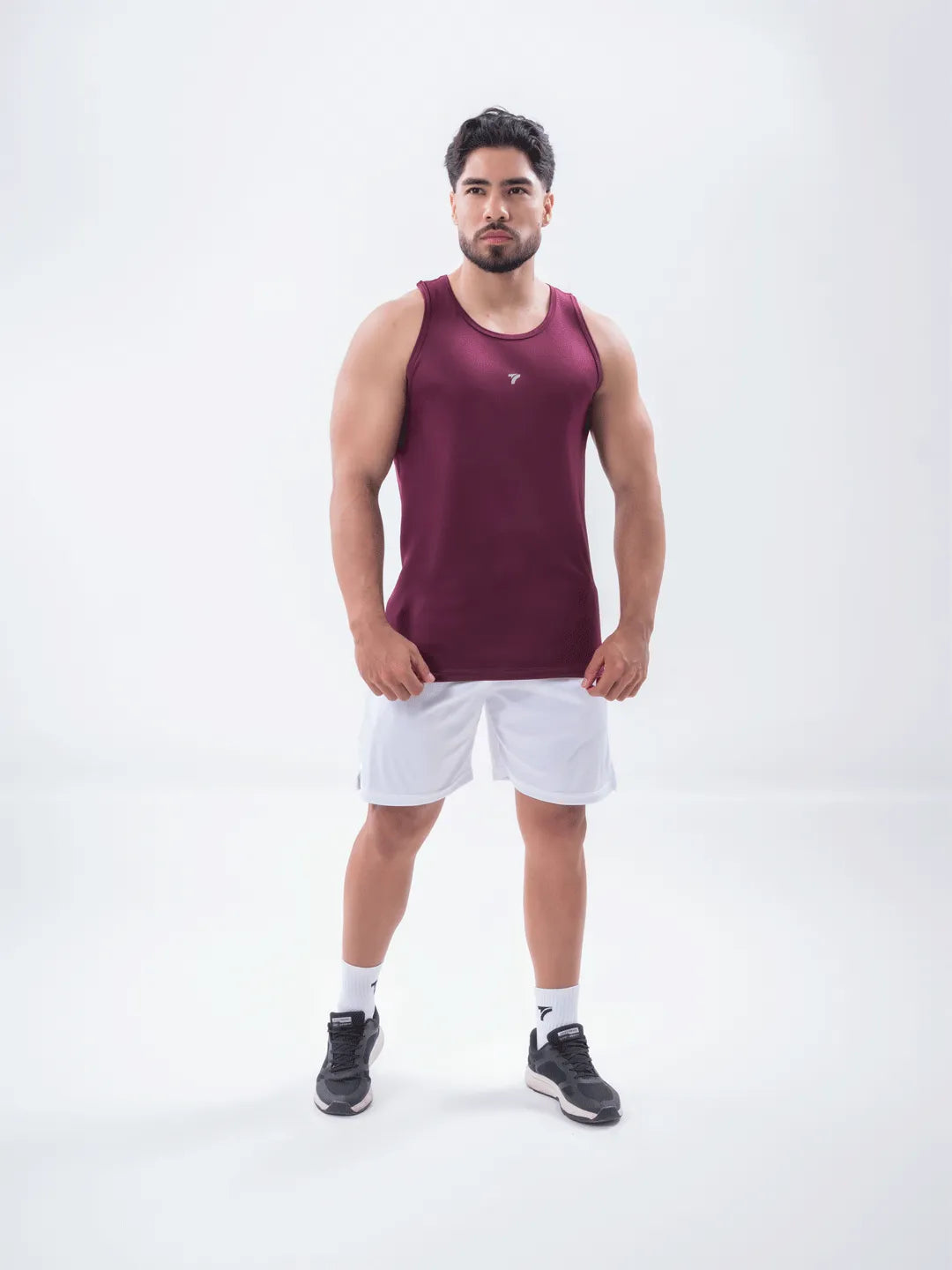 Esqueleto running hombre vinotinto oscuro hecho en Colombia TENFIT
