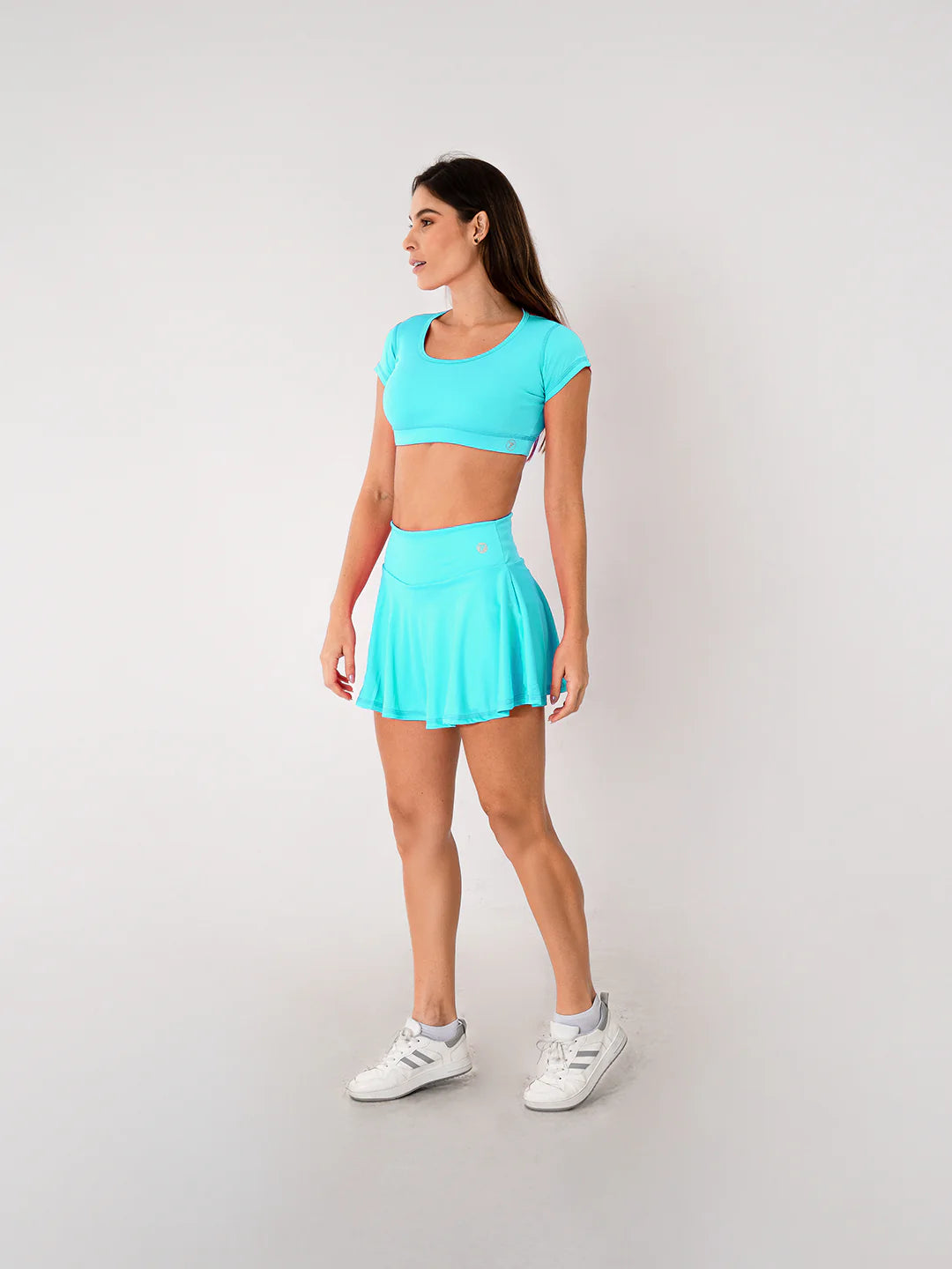 Falda deportiva verde menta secado rápido UV30 gym Colombia TENFIT