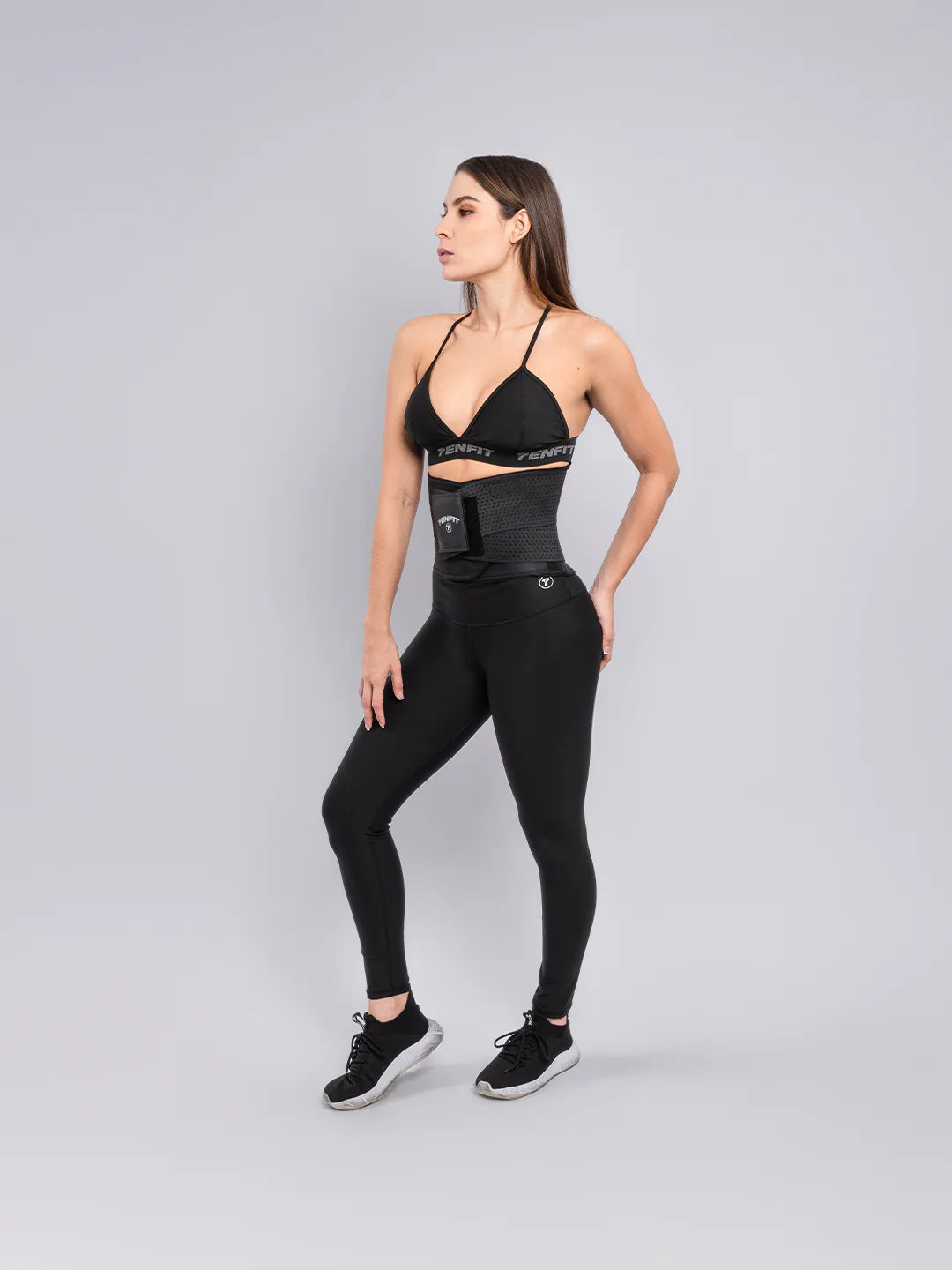 Cinturilla deportiva de compresión negra vista lateral — soporte lumbar TENFIT