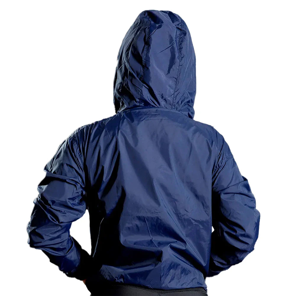 Chaqueta rompeviento azul turquí mujer TENFIT Sparta vista frontal