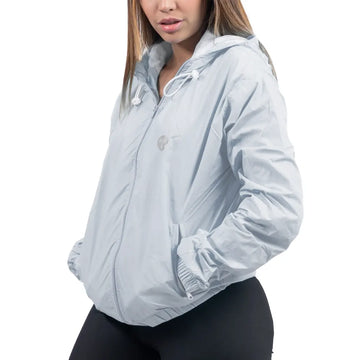 Chaqueta rompeviento gris claro mujer TENFIT Sparta vista frontal