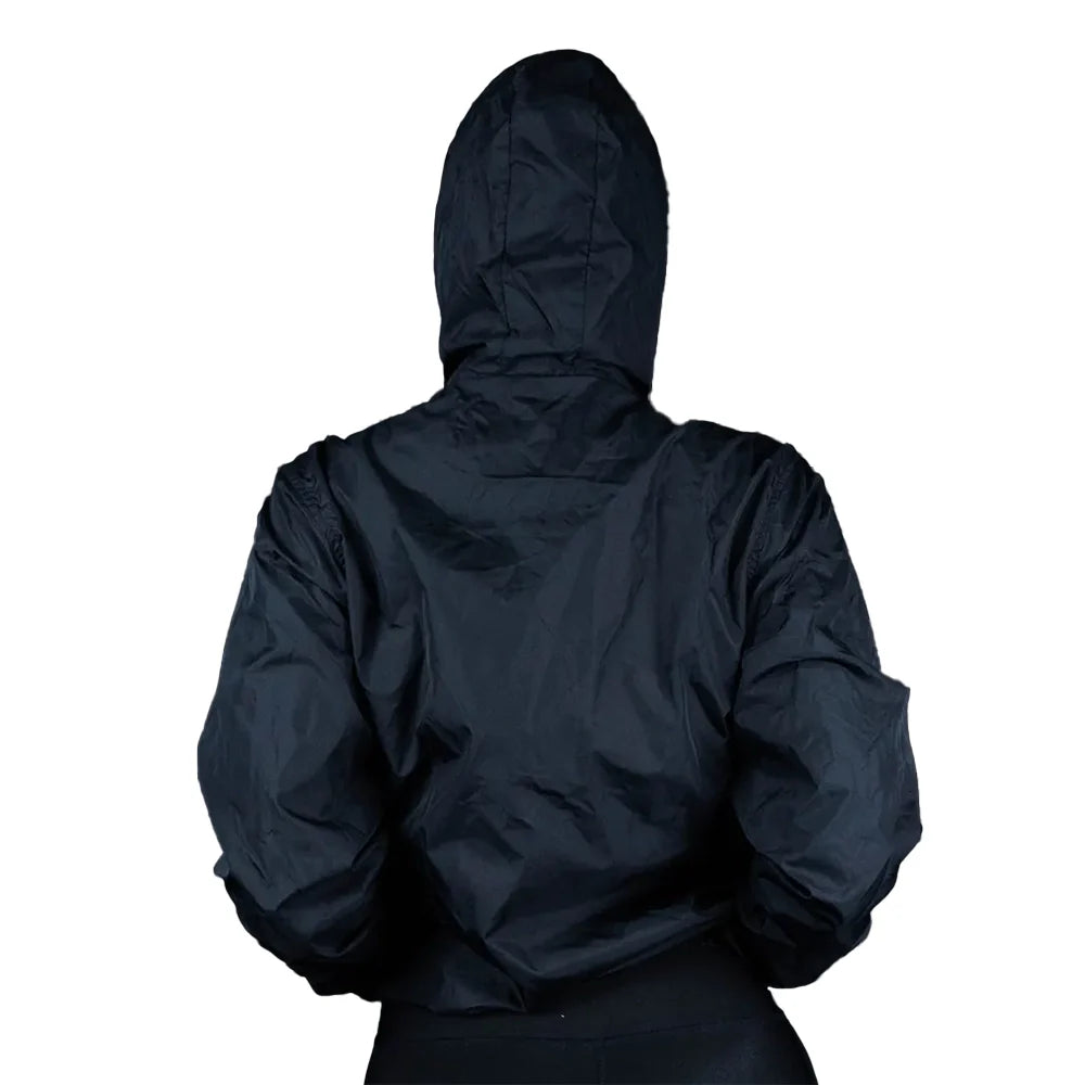 Chaqueta rompeviento negra mujer TENFIT Sparta vista frontal