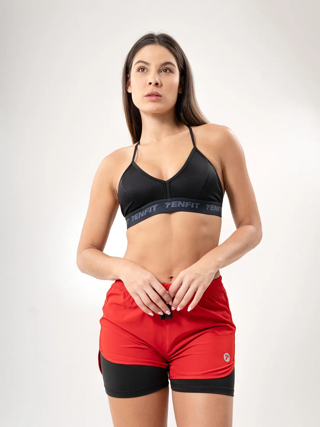 Short deportivo rojo antifluido para correr vista frente - TENFIT Colombia