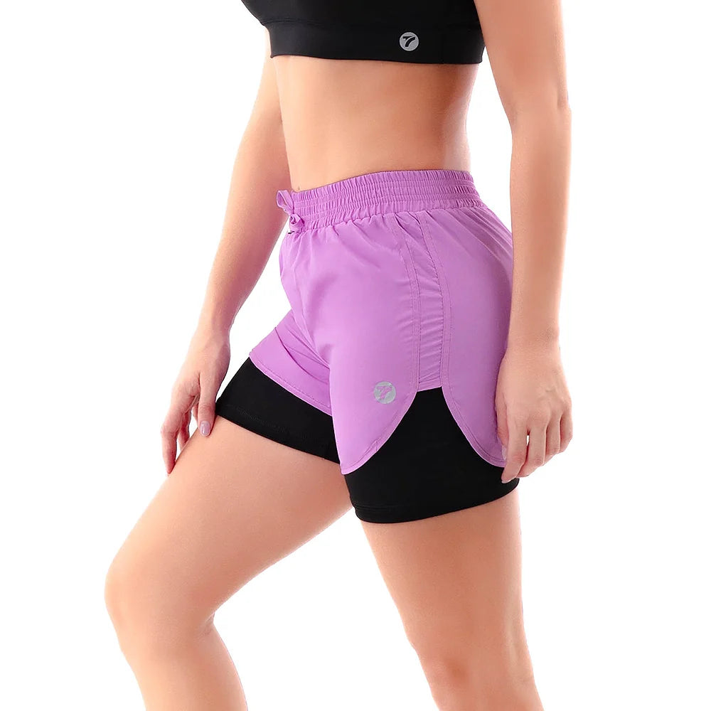 Short deportivo lila antifluido para correr - vista lateral TENFIT Colombia