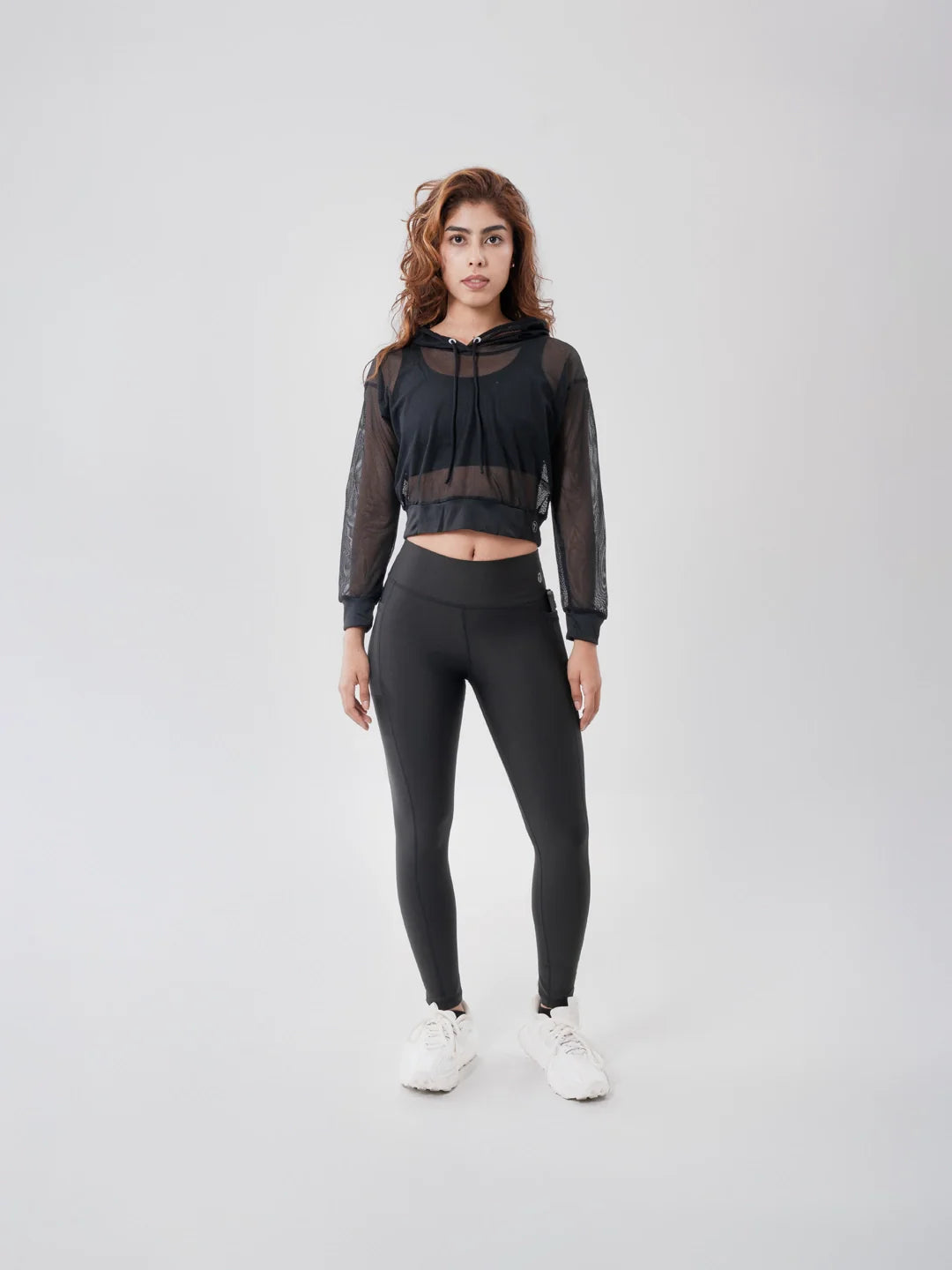 Buzo sport con capota negro mujer TENFIT Colombia