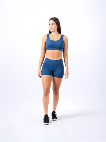 Top deportivo azul turquí mujer TENFIT - vista frontal