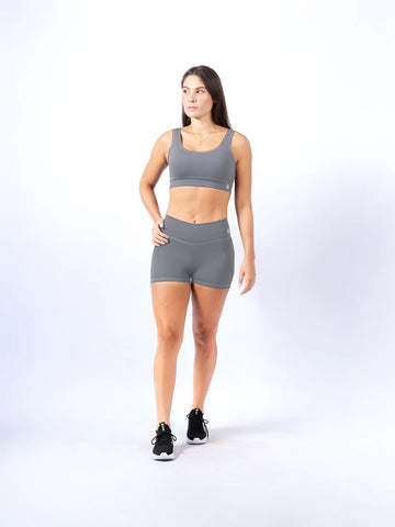 Top deportivo gris claro mujer TENFIT - vista frontal