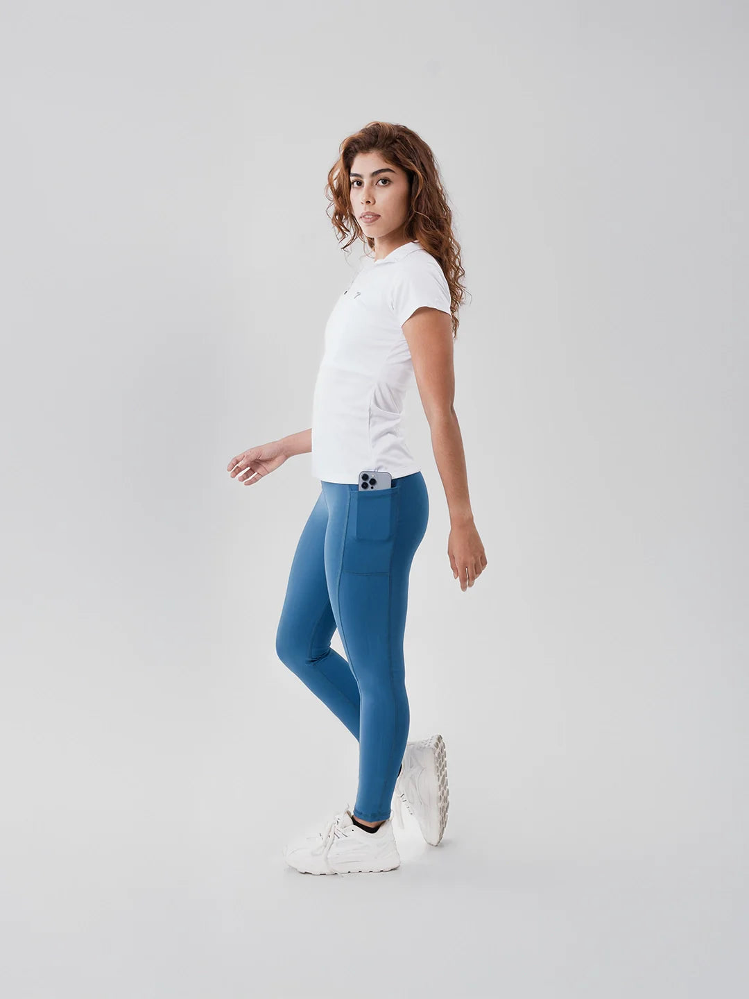 Legging deportivo azul petróleo tiro alto - perfil lateral TENFIT