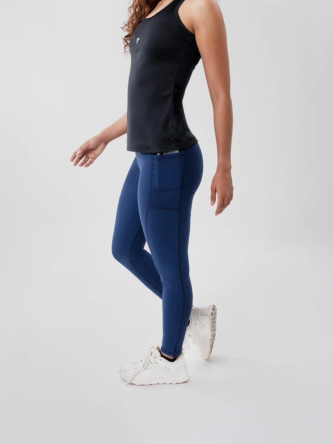 Legging azul turquí con bolsillo TENFIT - vista frontal