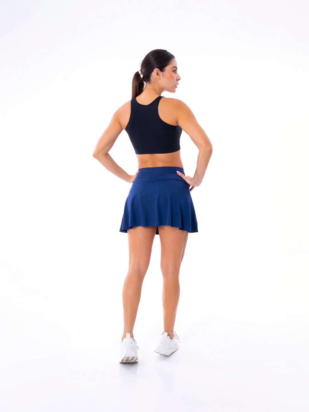 Vista posterior falda deportiva azul turquí sin transparencias TENFIT