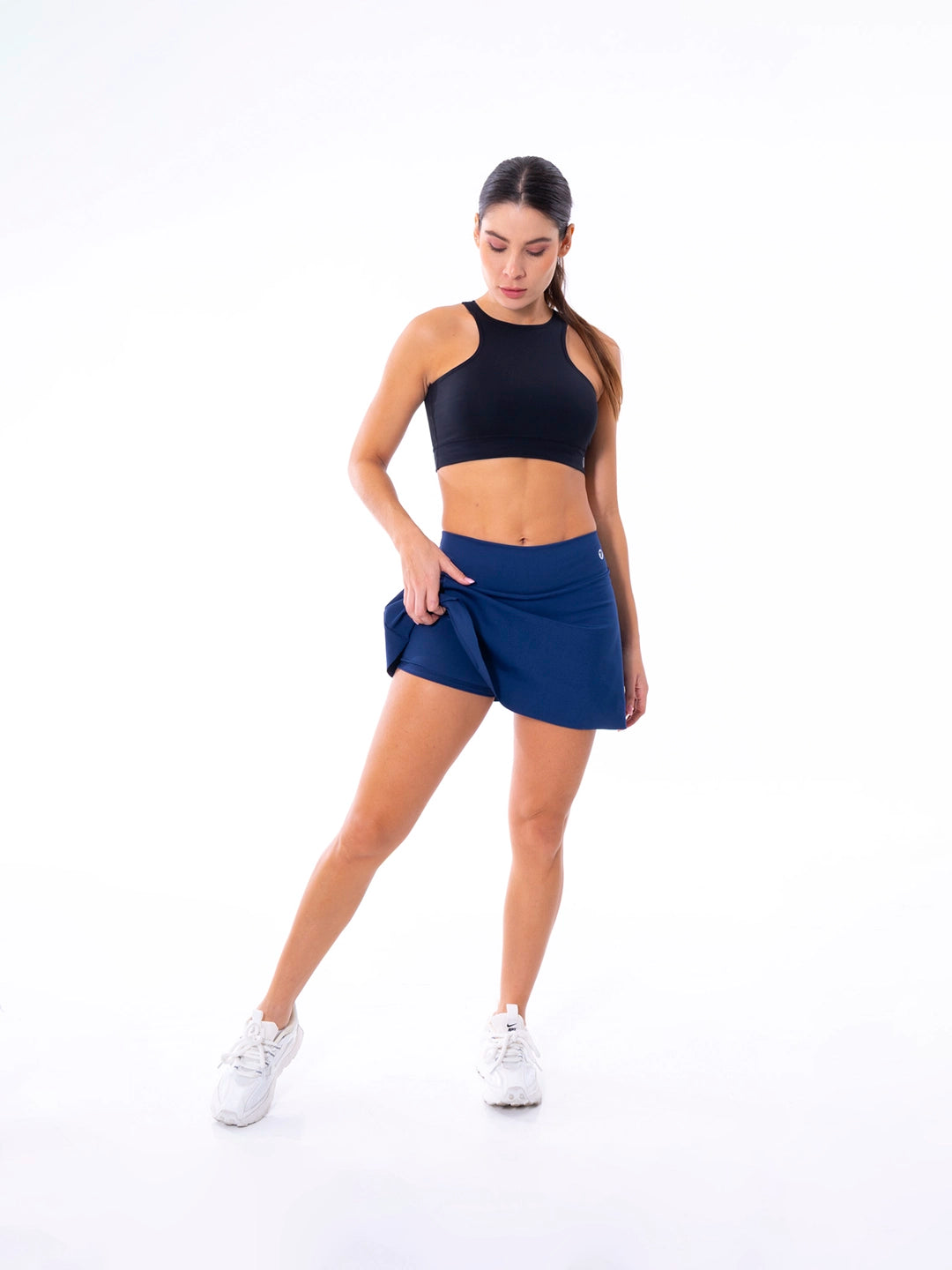 Falda short deportiva azul turquí con biker integrado — TENFIT