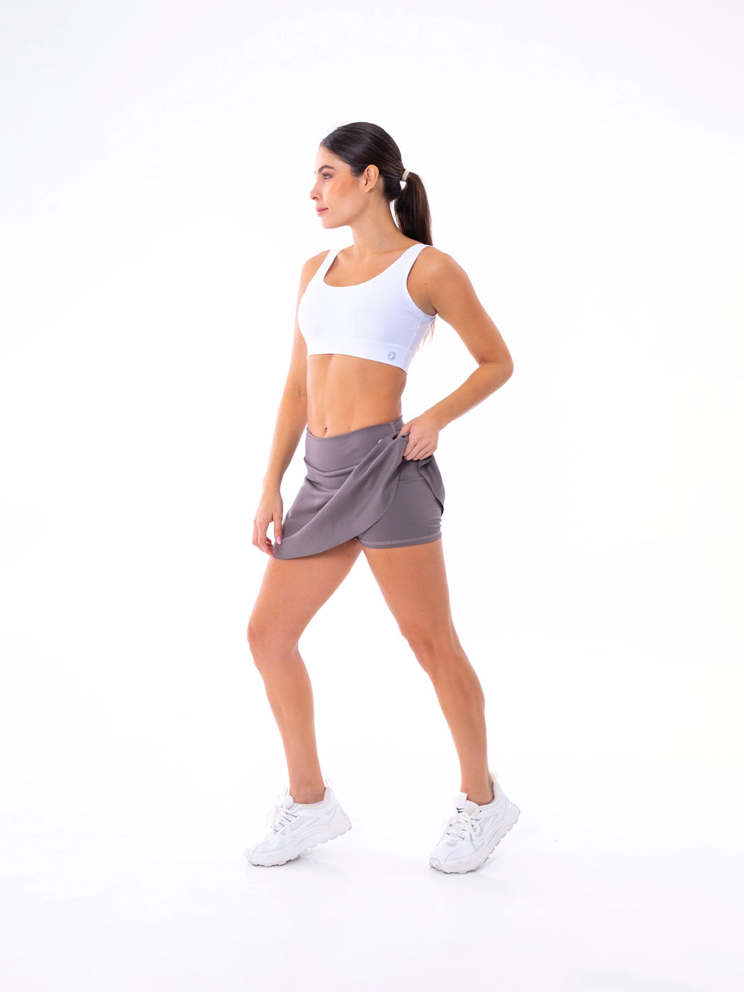 Falda short caqui ropa deportiva Colombia mujer biker integrado