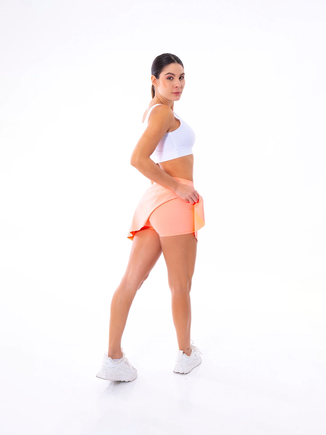 Falda skort mandarina tela elástica 4 vías pádel TENFIT Colombia