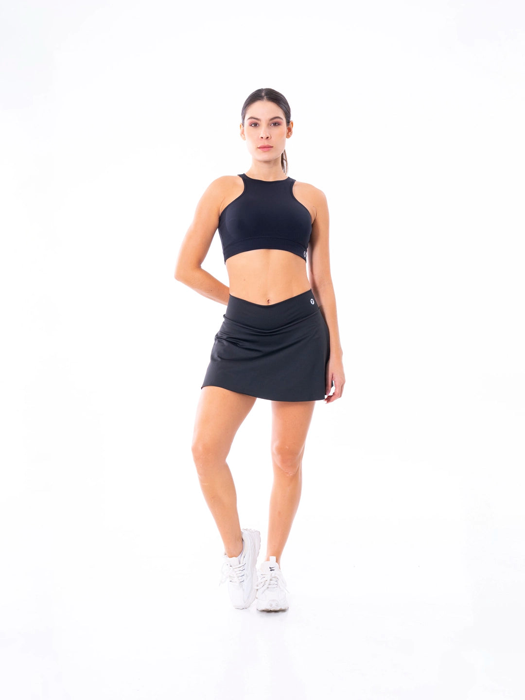 Falda skort negra tela elástica 4 vías gym padel TENFIT