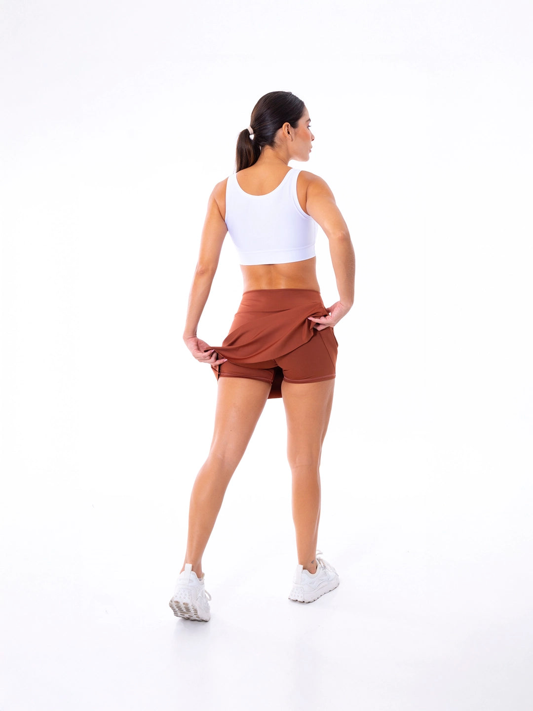 Detalle biker integrado falda terracota deportiva mujer Colombia