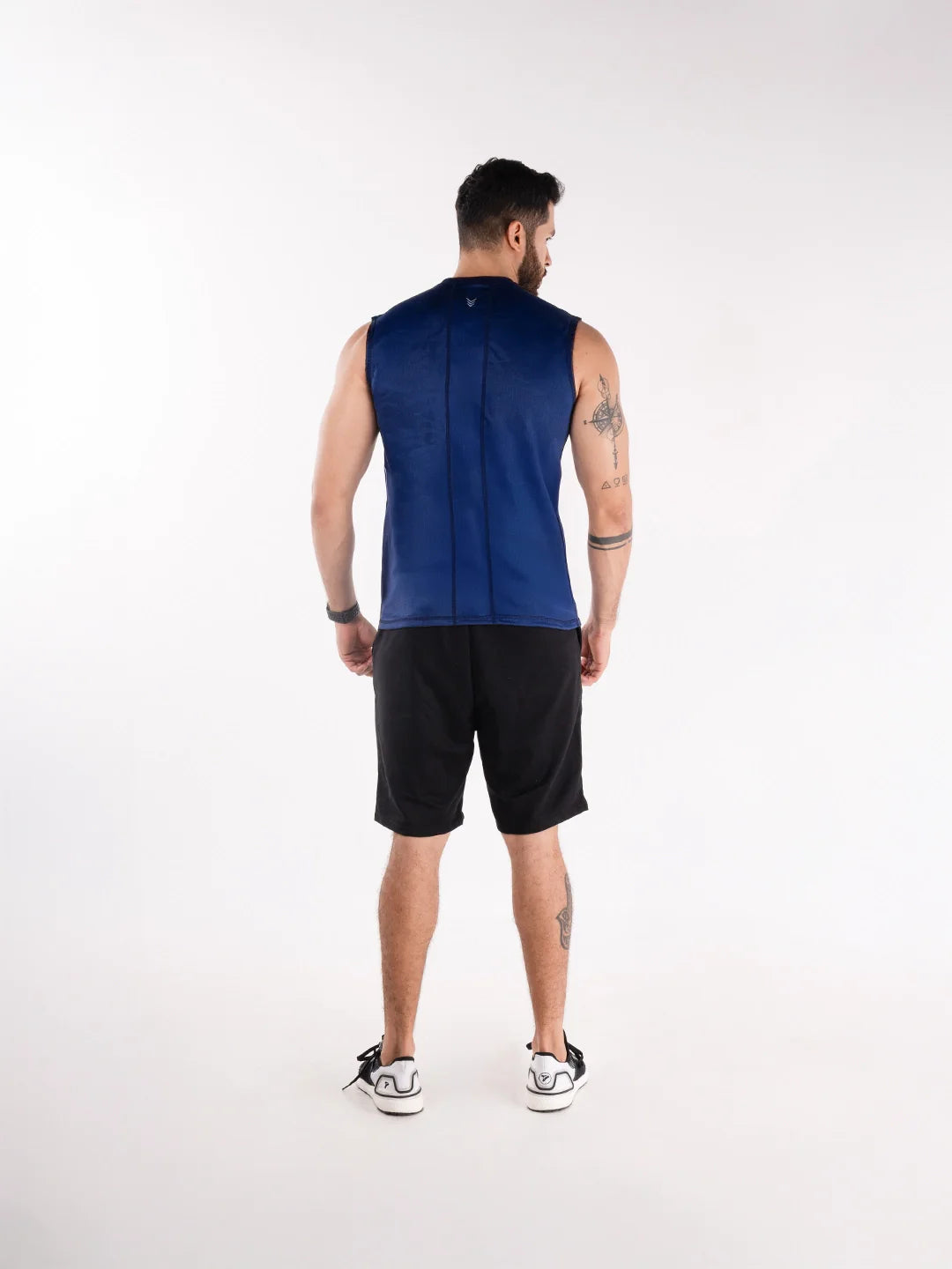 Camisilla transpirable hombre azul turquí TENFIT espalda