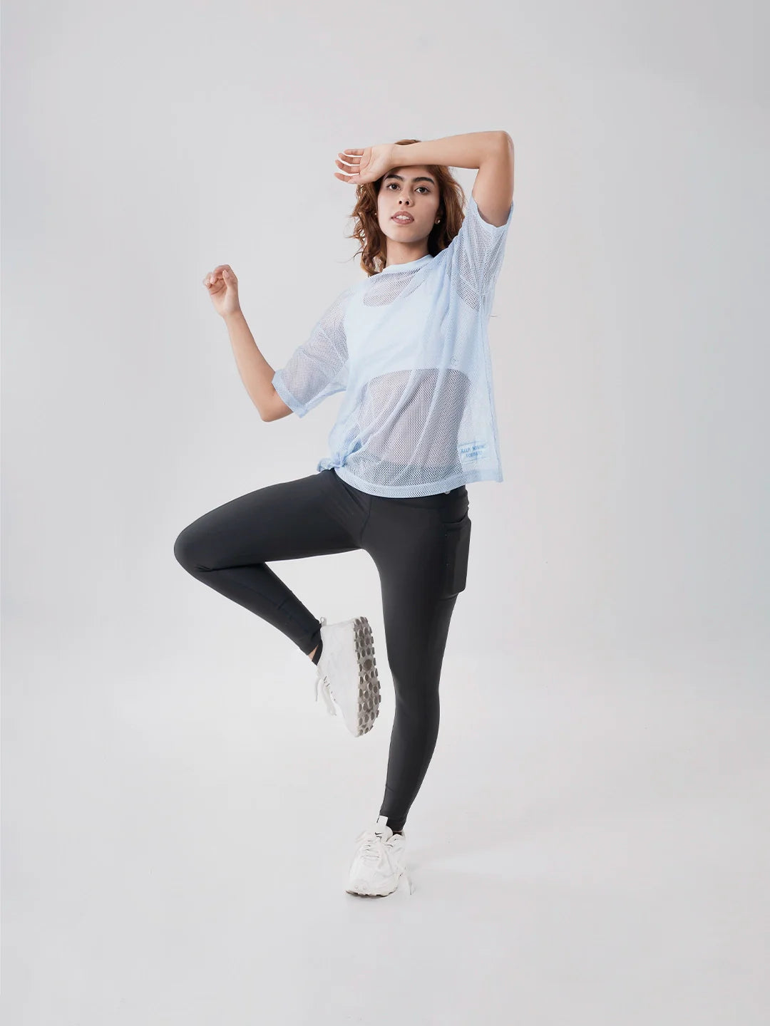 Camiseta deportiva azul celeste mujer TENFIT Airflow - frente
