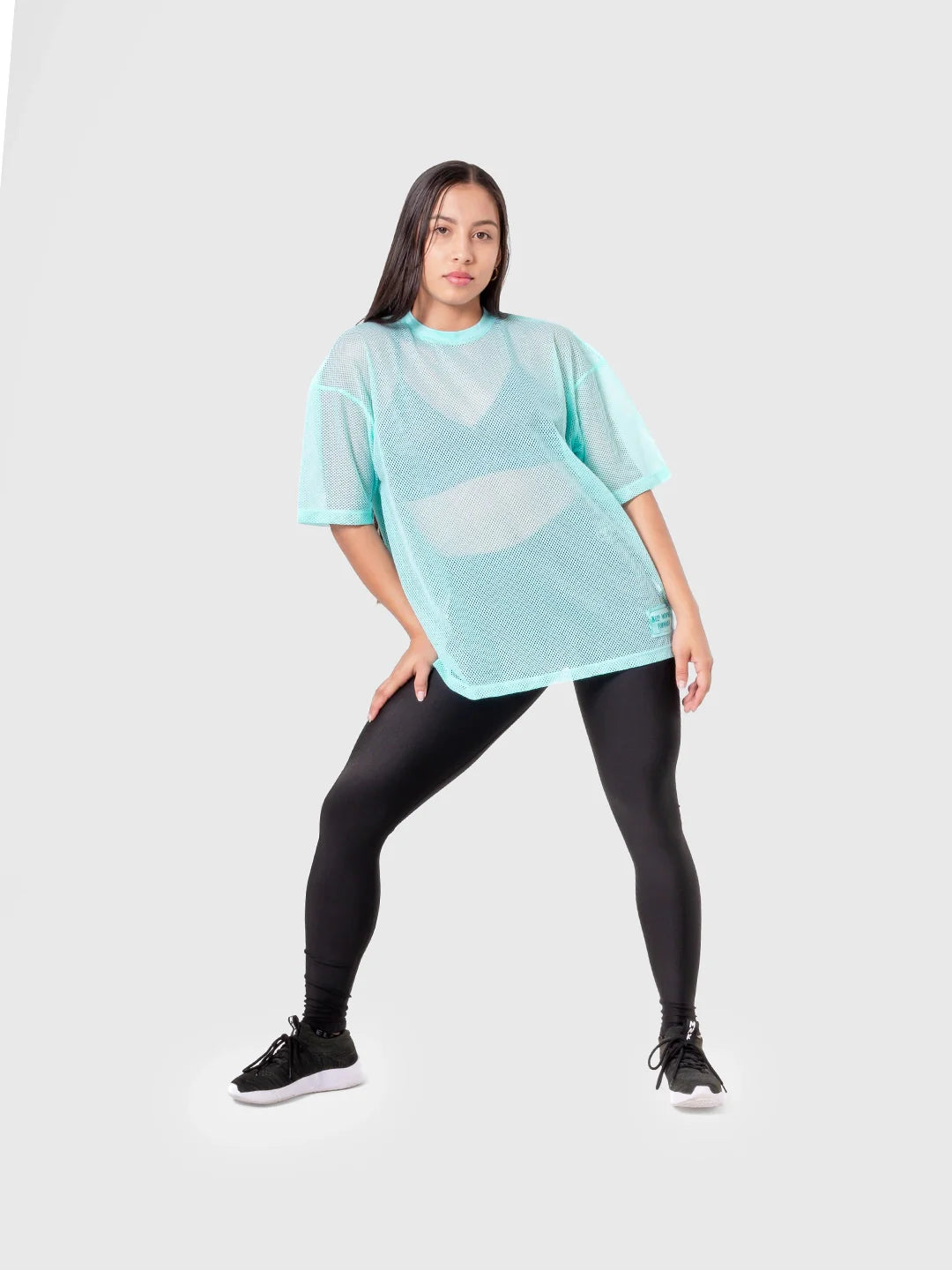Camiseta deportiva verde menta mujer TENFIT Airflow - vista de pose