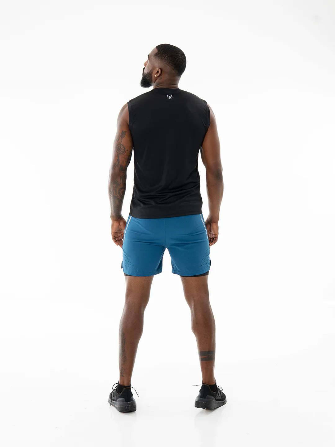 Pantaloneta Track Azul Petróleo vista trasera completa – TENFIT