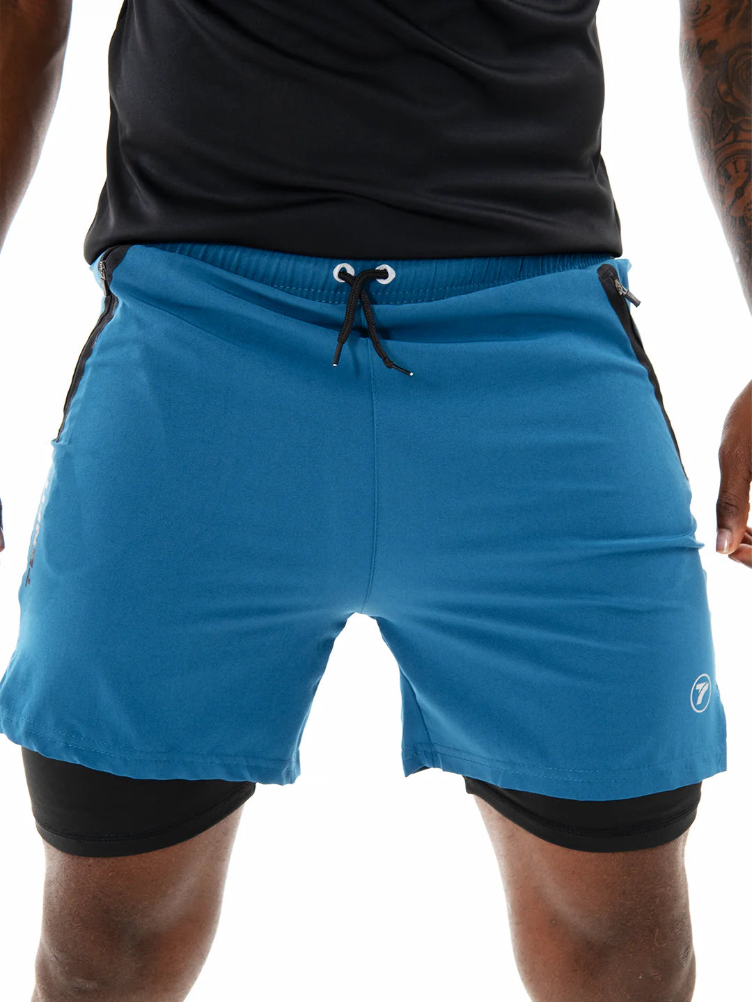 Pantaloneta Track Azul Petróleo frente detalle hombre – TENFIT