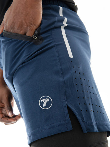 Pantaloneta Track Azul Turquí detalle corte hombre – TENFIT