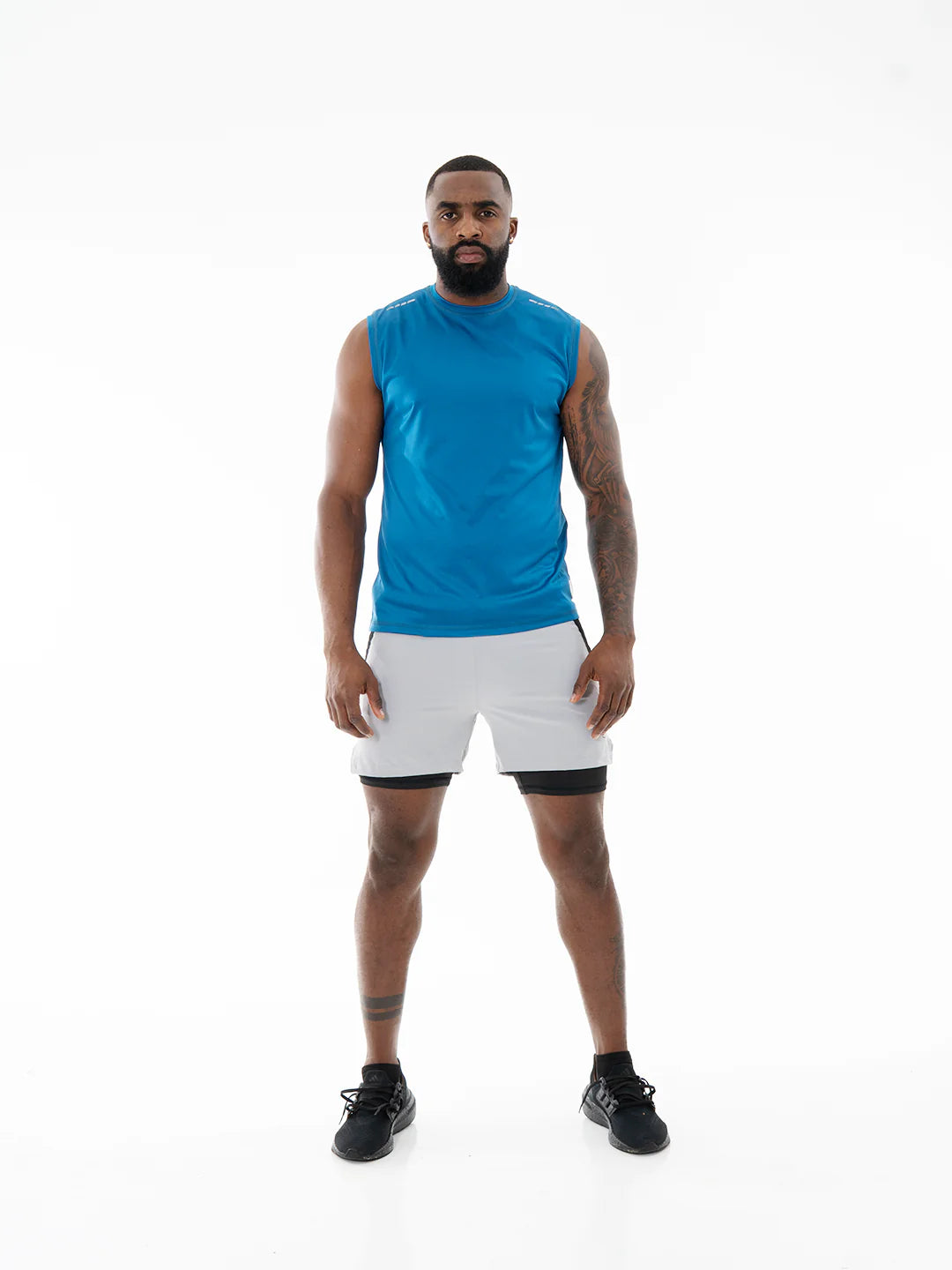 Pantaloneta Track gris claro frente – entrenamiento y gym hombre