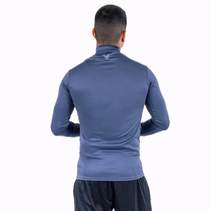 Buzo deportivo gris oscuro hombre compresión UV 30 secado rápido TENFIT Colombia