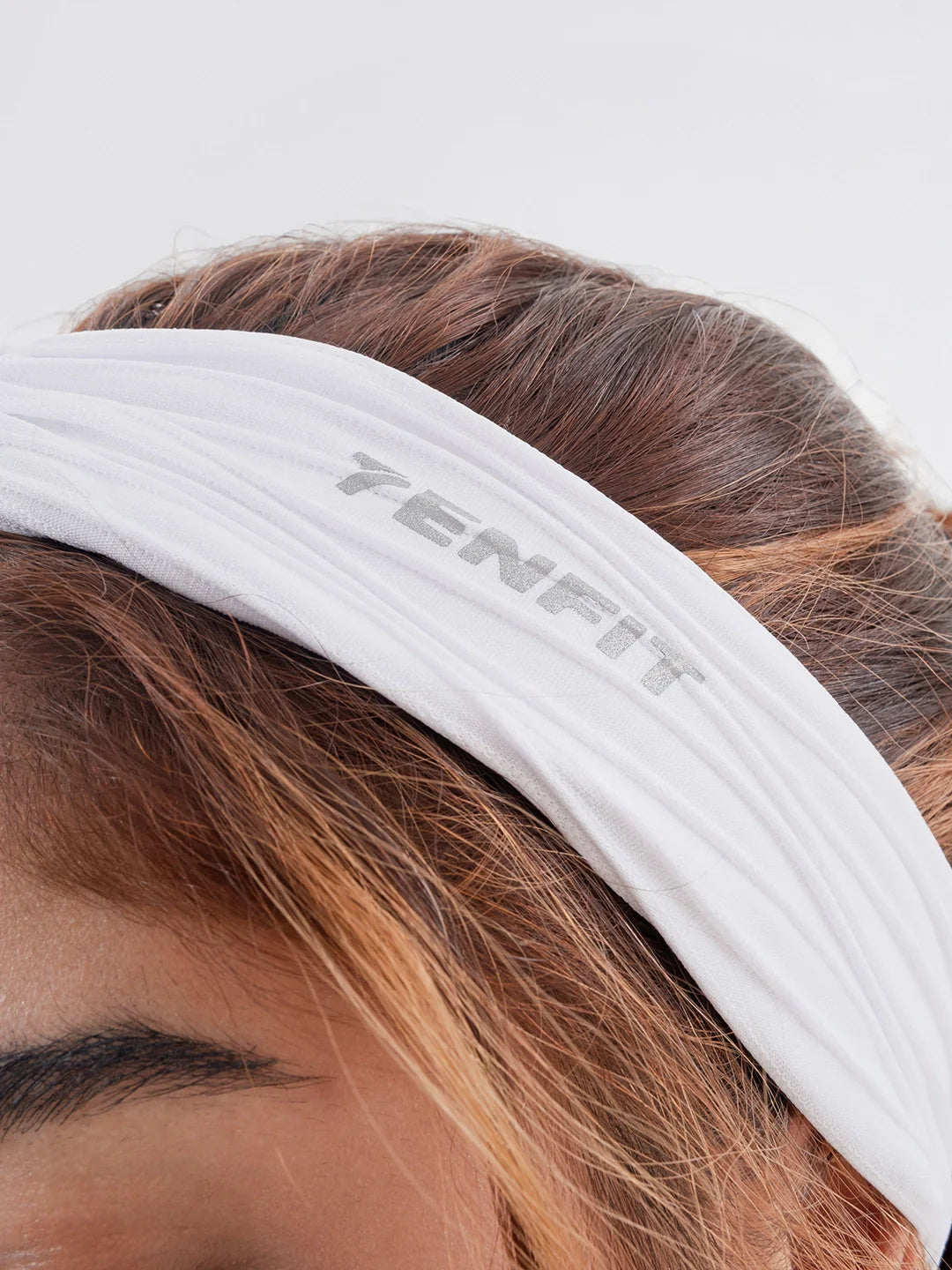 Detalle tela supplex banda cabello blanco sweatband TENFIT Colombia