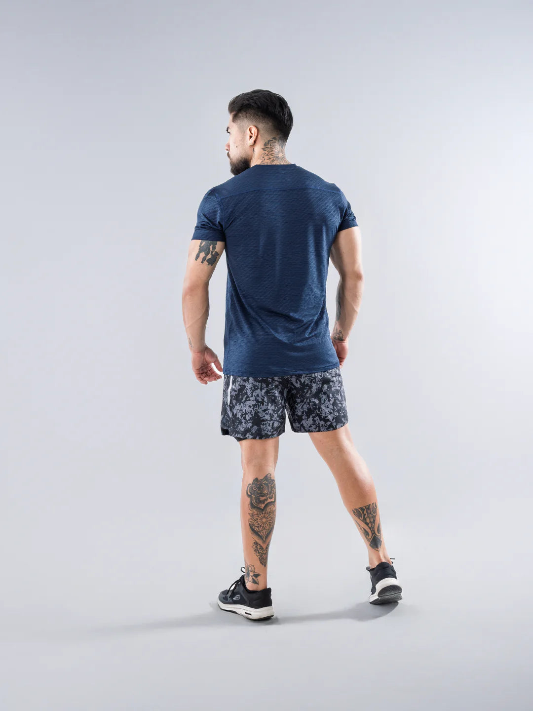 Camiseta deportiva hombre azul turquí espalda secado rápido entrenamiento TENFIT