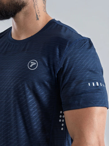 Camiseta Quick Dry azul turquí hombre detalle tejido transpirable TENFIT