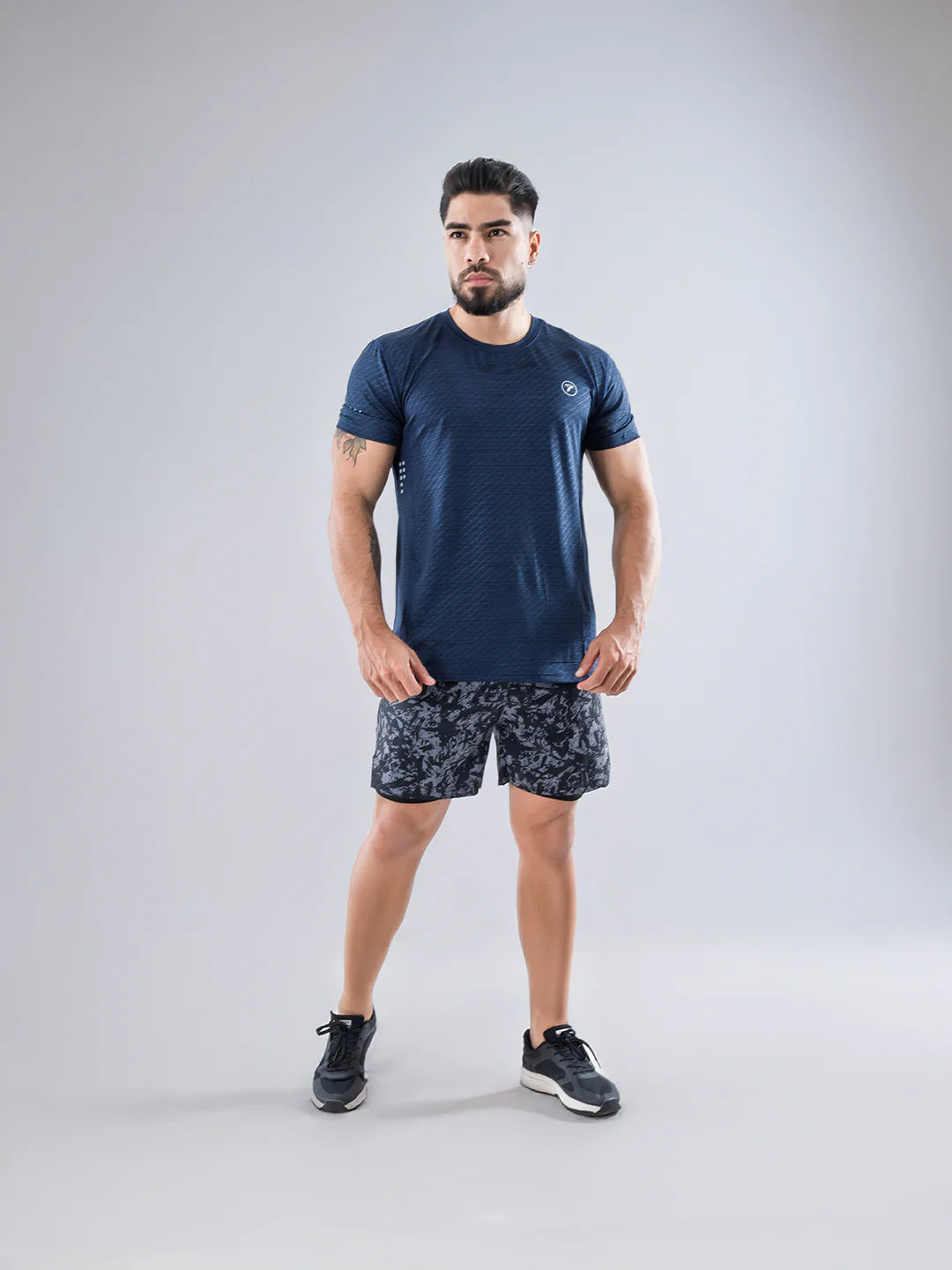 Camiseta deportiva azul turquí hombre vista frontal running Colombia TENFIT