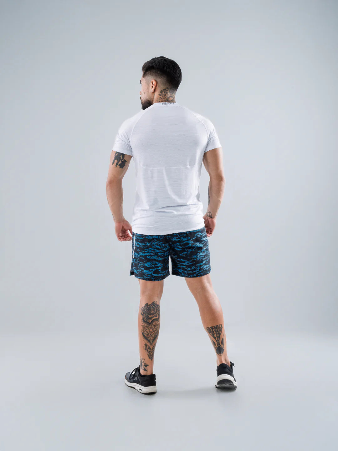 Camiseta deportiva hombre blanca espalda secado rápido outdoor TENFIT