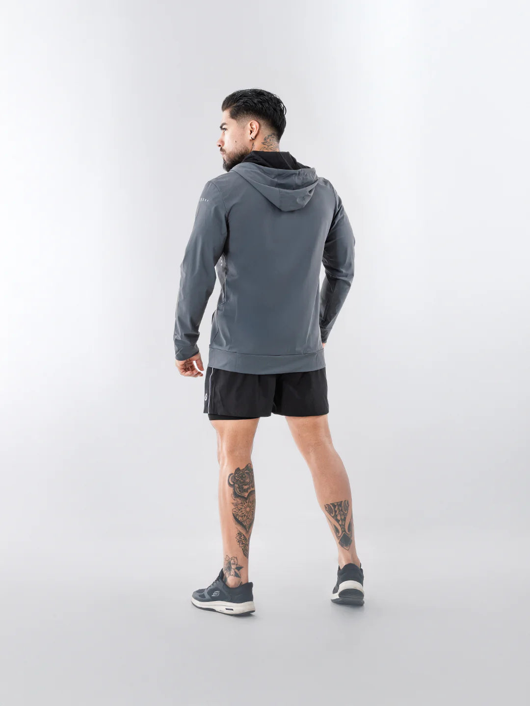Chaqueta running gris oscuro TENFIT hombre - vista posterior